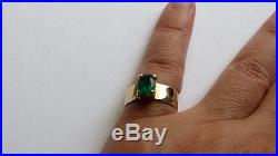Gold hammered wide band ring with green stone James Avery