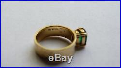 Gold hammered wide band ring with green stone James Avery