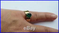 Gold hammered wide band ring with green stone James Avery