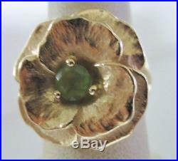 James Avery 14 Kt Gold Floral Ring with Green Stone in a Size 7 (14.7 gms)