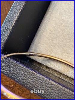 RETIRING JAMES AVERY SWEDEGED HOOPS MEDIUM SIZE 14K GOLD With CURVED TOP CLOSURE