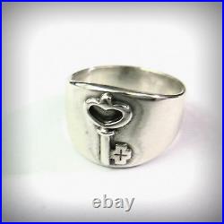 Retired James Avery Vintage Wide Tapering Band Ring with Key Sterling Silver